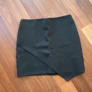 BLACK ASYMMETRICAL SKIRT